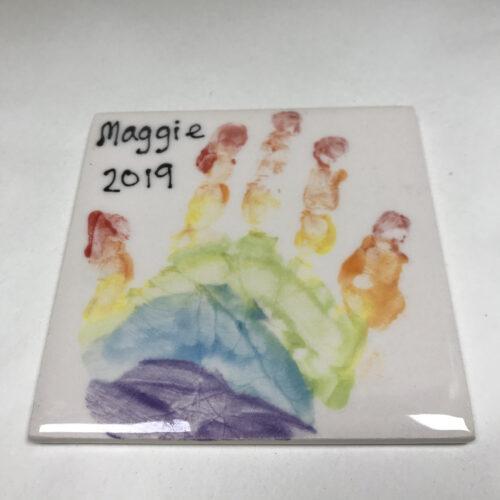 rainbow hand print coaster